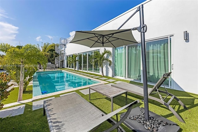 2112 NE 17th Ave, Wilton Manors, FL 33305 - pool featuring a patio area and a yard