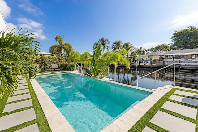 2112 NE 17th Ave, Wilton Manors, FL 33305 - outdoor pool featuring a water view