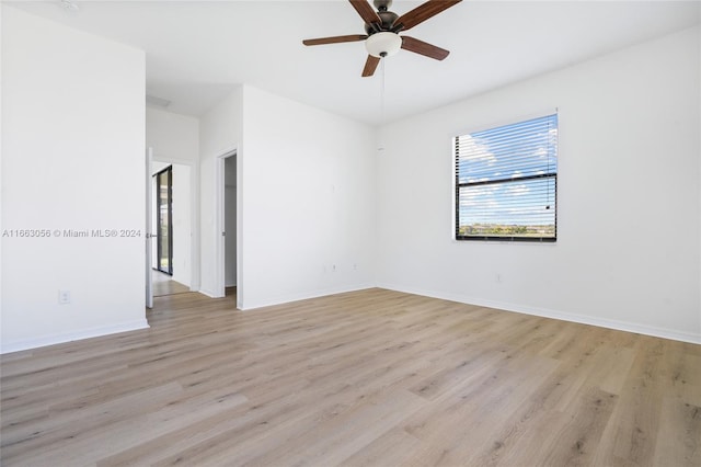 unfurnished room with ceiling fan and light hardwood / wood-style flooring