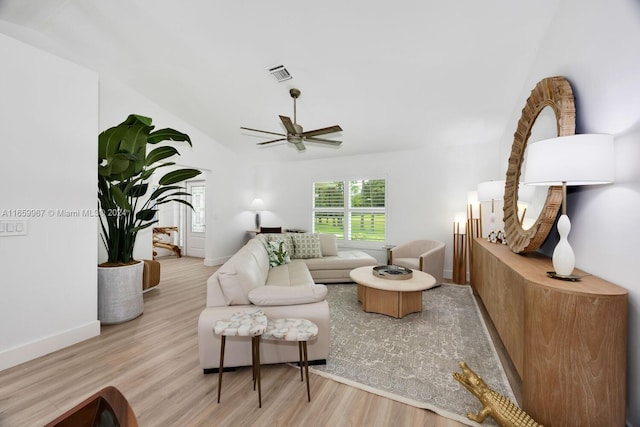 living room featuring light wood-type flooring and ceiling fan