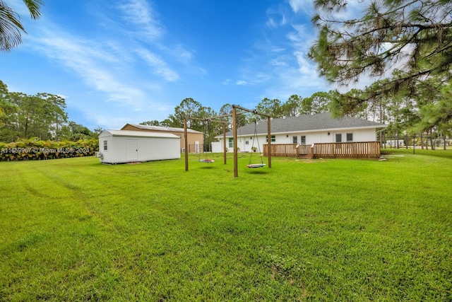 view of yard featuring a wooden deck