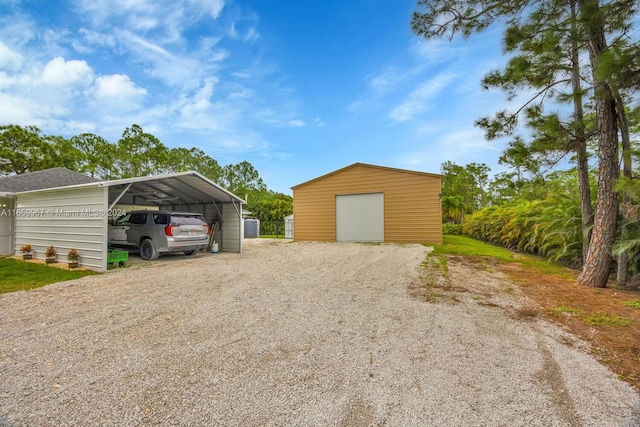 garage with a carport