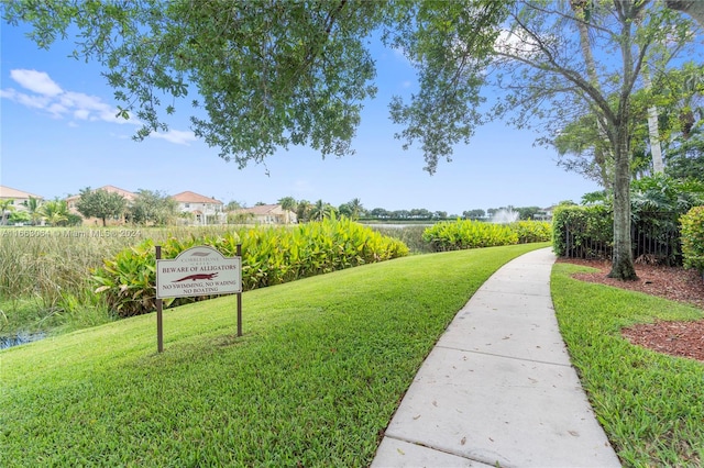 view of community featuring a yard