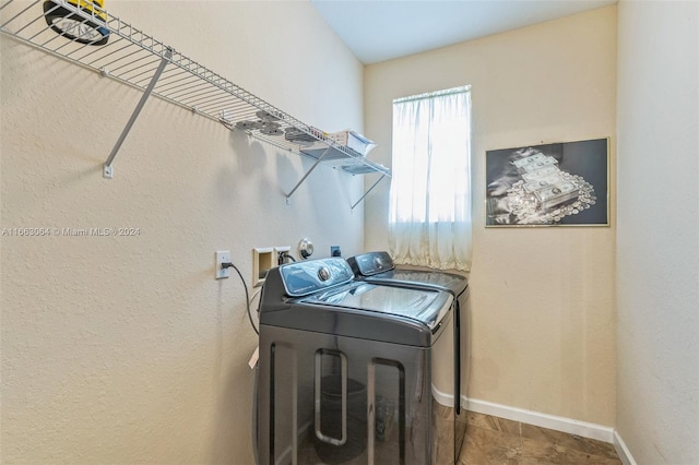 laundry room featuring independent washer and dryer