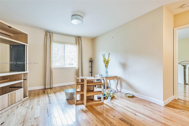 dining area with light hardwood / wood-style floors