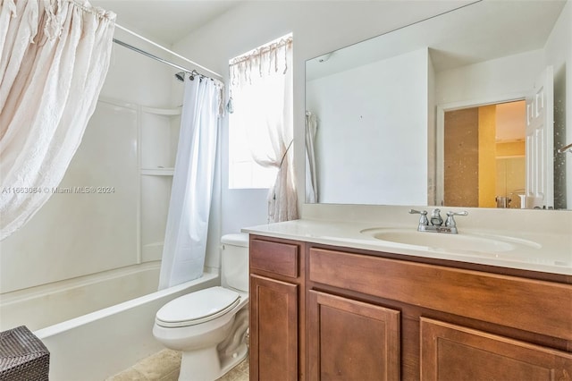 full bathroom with vanity, toilet, shower / bath combo with shower curtain, and tile patterned floors