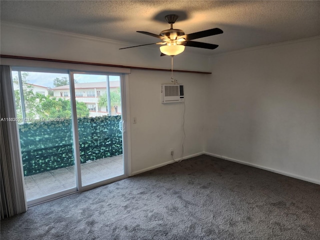 unfurnished room with ceiling fan, carpet flooring, a wall mounted AC, and a textured ceiling