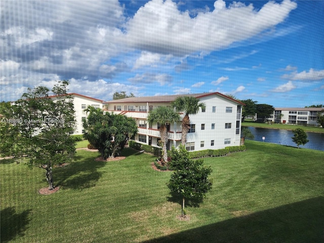 exterior space with a water view