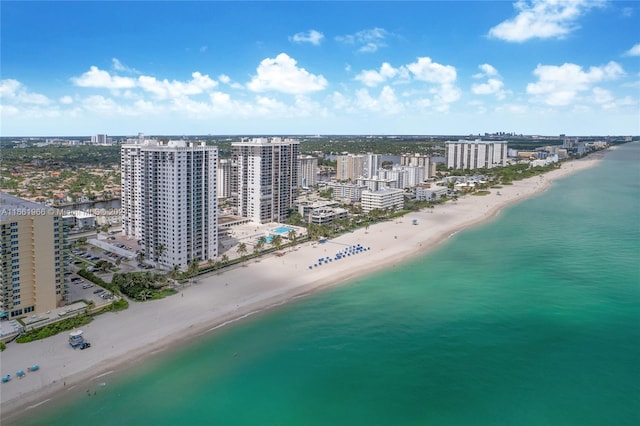 aerial view featuring a view of the beach and a water view