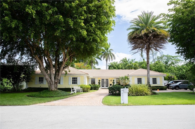 view of front of home with a front yard