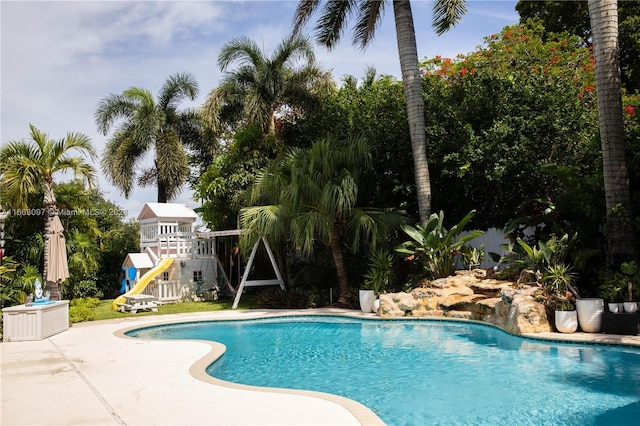 view of swimming pool with a patio