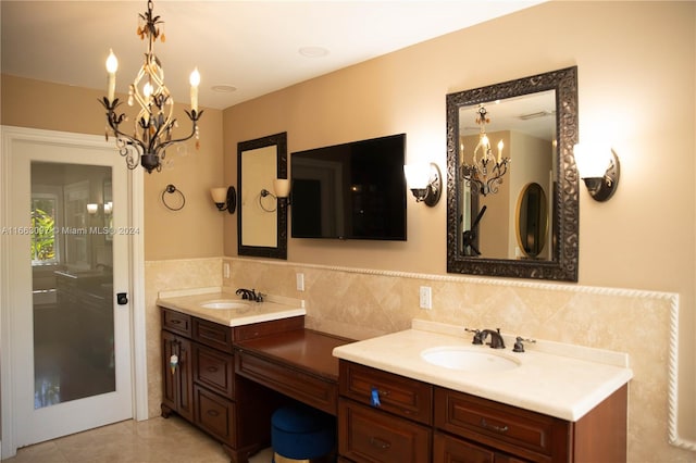 bathroom with tile patterned floors and vanity