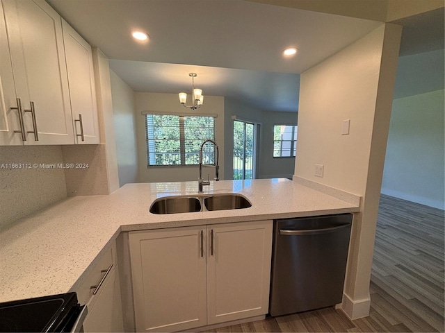 kitchen featuring stainless steel dishwasher, dark hardwood / wood-style floors, white cabinets, and sink