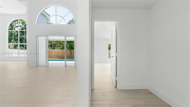 spare room featuring light wood-type flooring