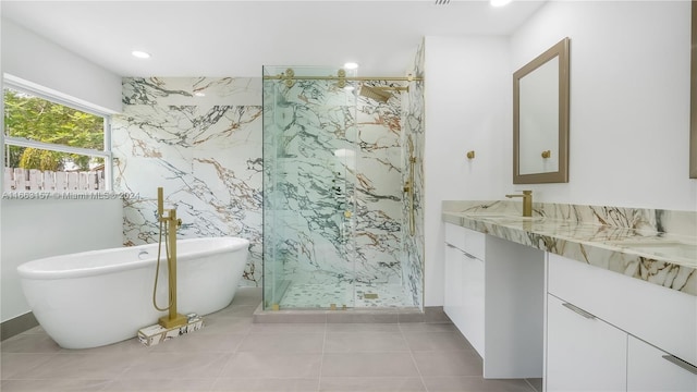 bathroom with vanity, separate shower and tub, and tile patterned floors