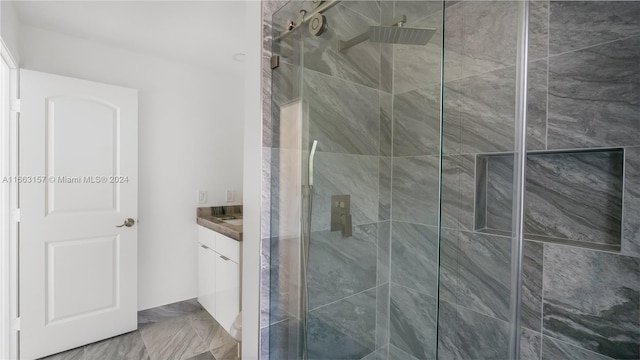 bathroom with vanity and an enclosed shower