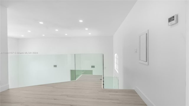 laundry room featuring light hardwood / wood-style floors