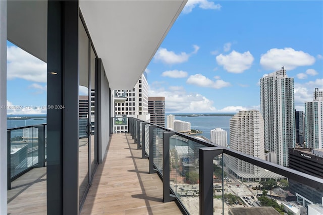 balcony featuring a water view