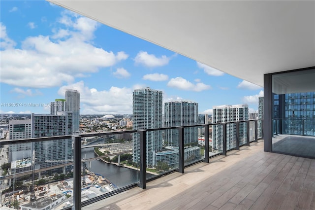 balcony featuring a water view