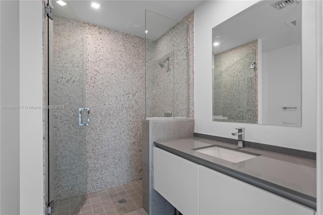 68 SE 6th St Unit 3102, Miami, FL 33131 - full bathroom with a shower stall, vanity, and tile patterned flooring