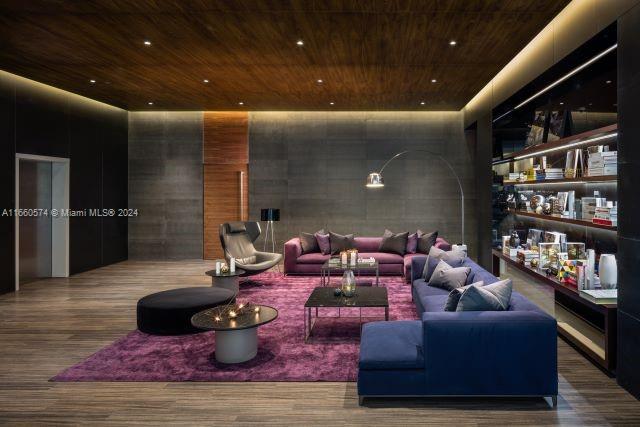 interior space with wooden ceiling and wood-type flooring