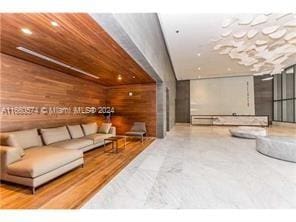 68 SE 6th St Unit 3102, Miami, FL 33131 - community lobby featuring recessed lighting and wood walls