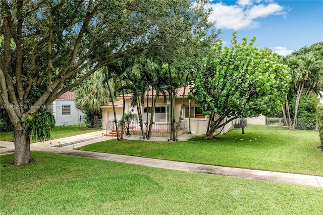 view of front of house with a front yard