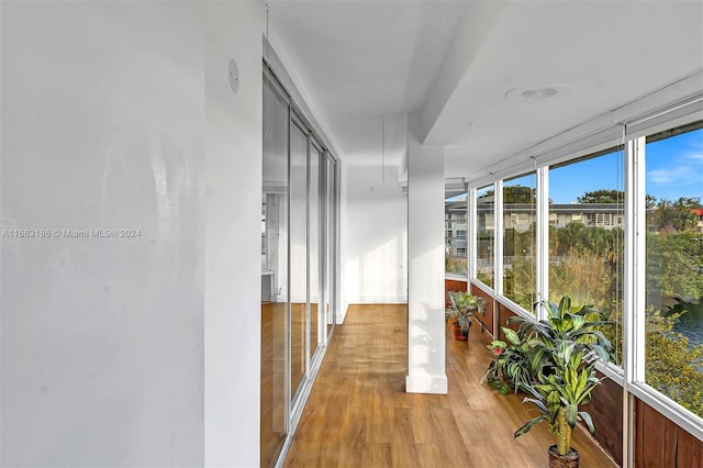 unfurnished sunroom featuring a healthy amount of sunlight