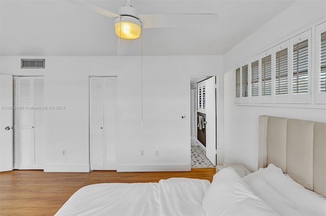 bedroom featuring ceiling fan and hardwood / wood-style floors