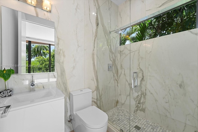 bathroom featuring tile walls, vanity, toilet, and an enclosed shower