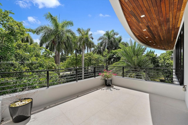 view of patio featuring a balcony