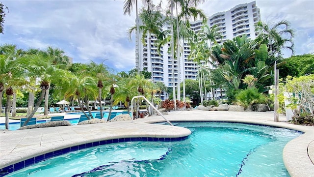 view of swimming pool with a patio area