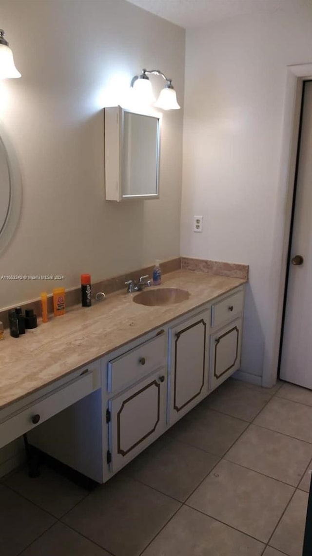 bathroom featuring vanity and tile patterned floors