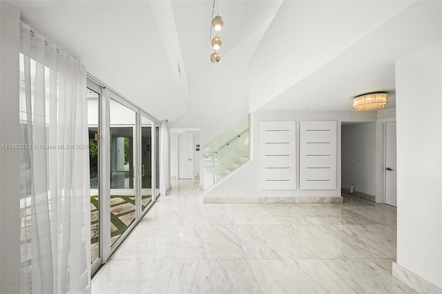 interior space featuring high vaulted ceiling