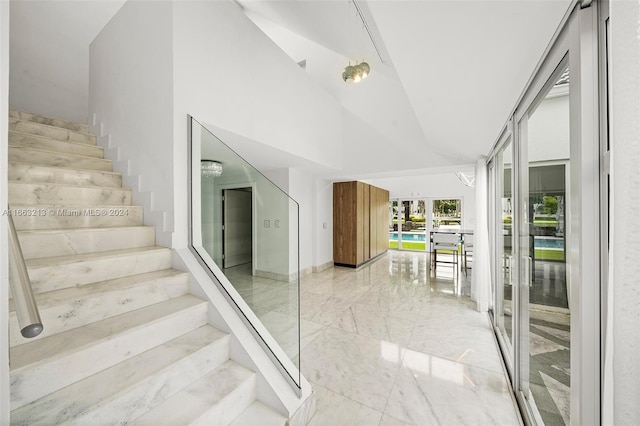 interior space featuring high vaulted ceiling