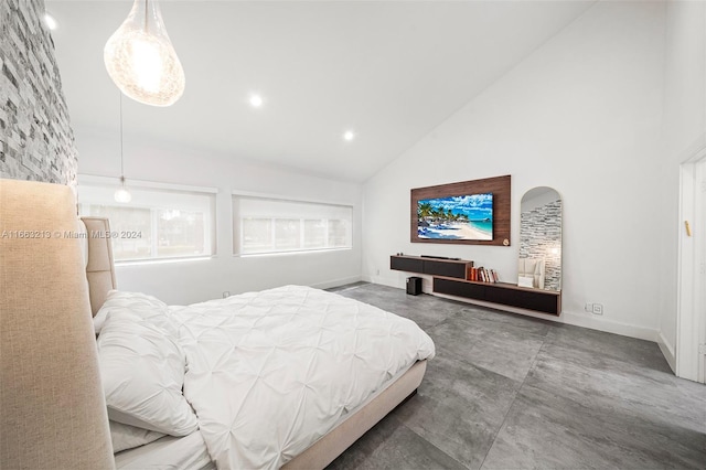 bedroom featuring high vaulted ceiling