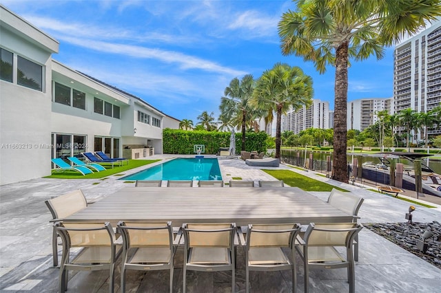 view of swimming pool featuring a patio