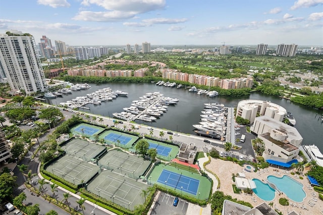 birds eye view of property with a water view