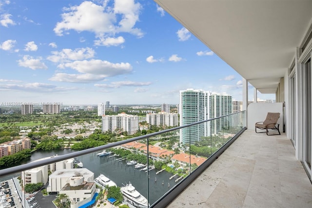 balcony featuring a water view