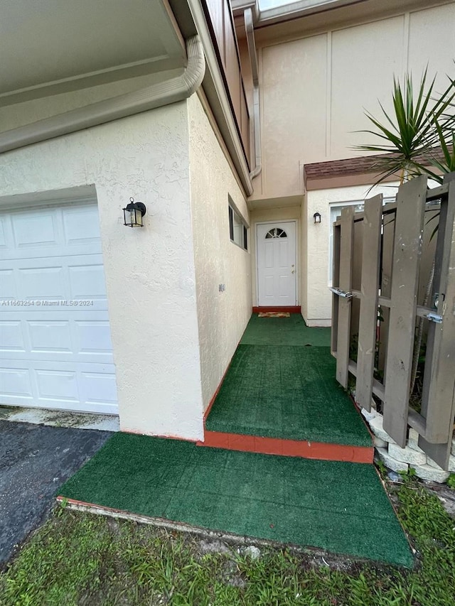 property entrance featuring a garage