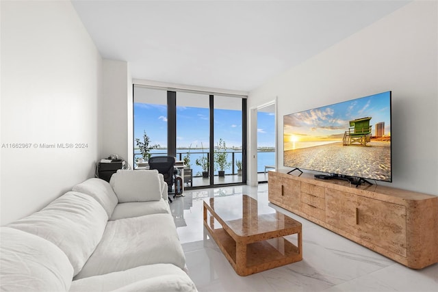 living room with floor to ceiling windows