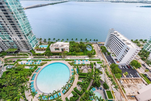 birds eye view of property featuring a water view