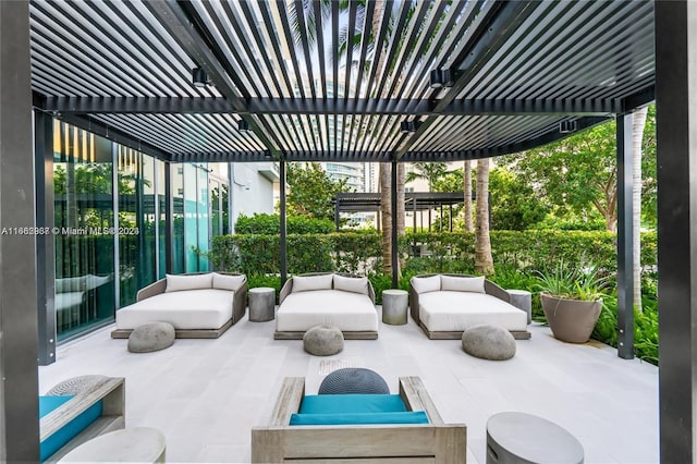 view of patio featuring an outdoor hangout area and a pergola