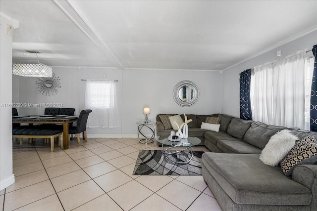 living room featuring a notable chandelier, beam ceiling, light tile patterned floors, and crown molding