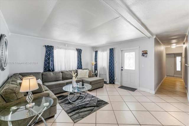 tiled living room featuring a textured ceiling and ornamental molding