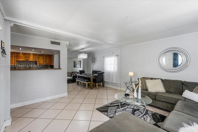 living room with light tile patterned flooring and ornamental molding