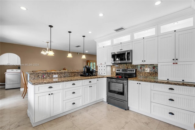 kitchen with washer / clothes dryer, appliances with stainless steel finishes, white cabinets, and decorative light fixtures