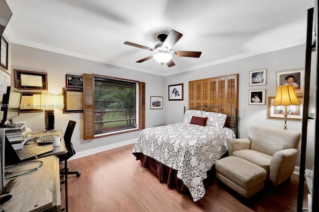 7706 SW 74th Ln, Miami, FL 33143 - bedroom with ceiling fan, baseboards, ornamental molding, and wood finished floors