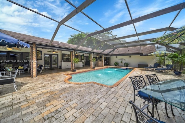 7706 SW 74th Ln, Miami, FL 33143 - outdoor pool with a lanai, french doors, a patio area, and ceiling fan
