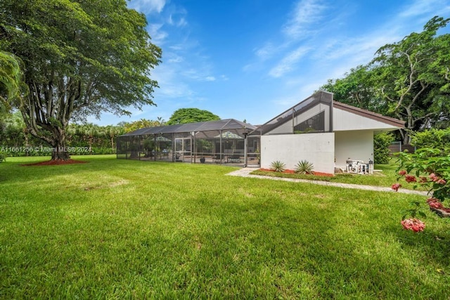 7706 SW 74th Ln, Miami, FL 33143 - view of yard featuring glass enclosure